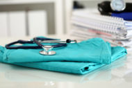 Folded hospital scrubs