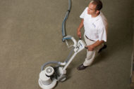 ChemDry technician cleaning carpet