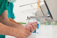 Medical practitioners wash their hands