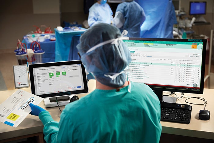 medical staff working with digital data