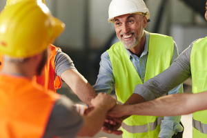 Construction team with hands in